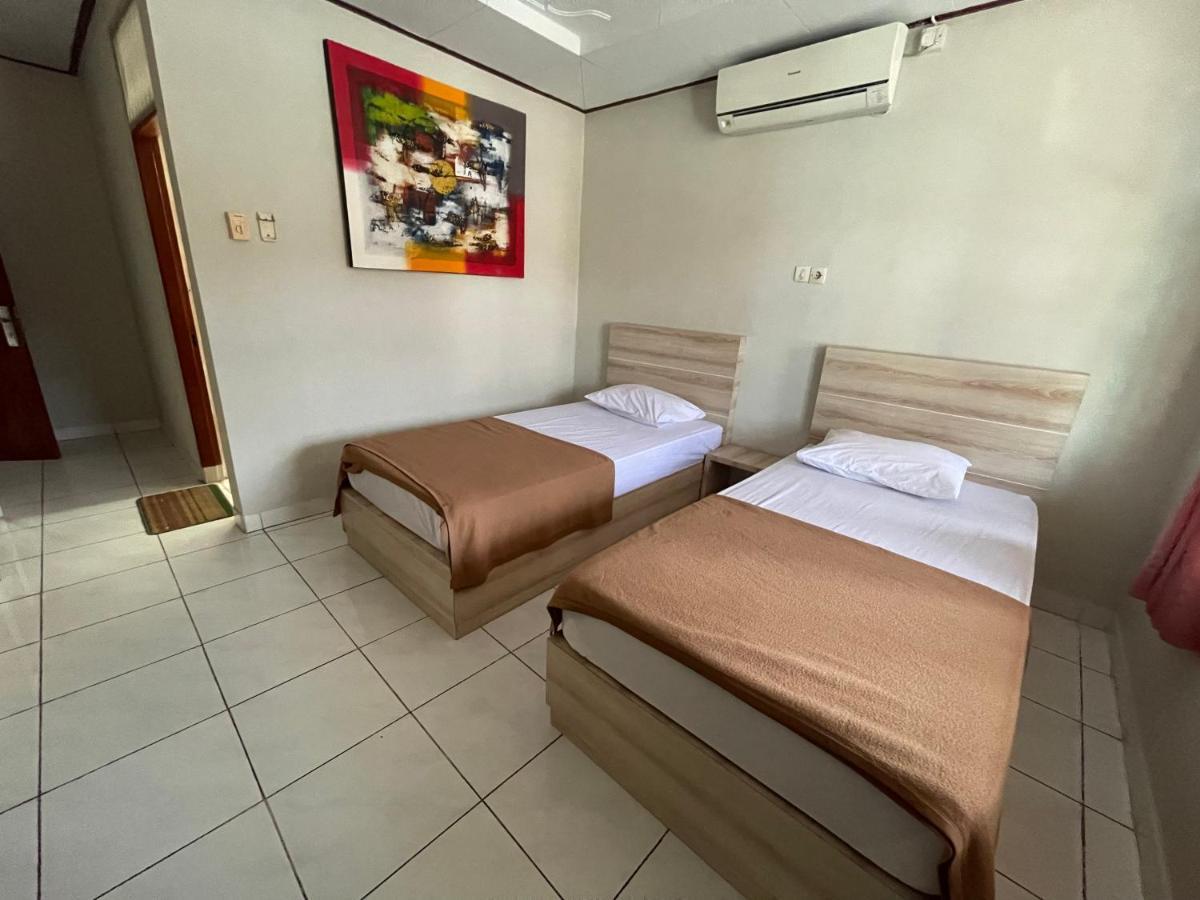 Palm Garden Kuta Hotel Кута Екстериор снимка