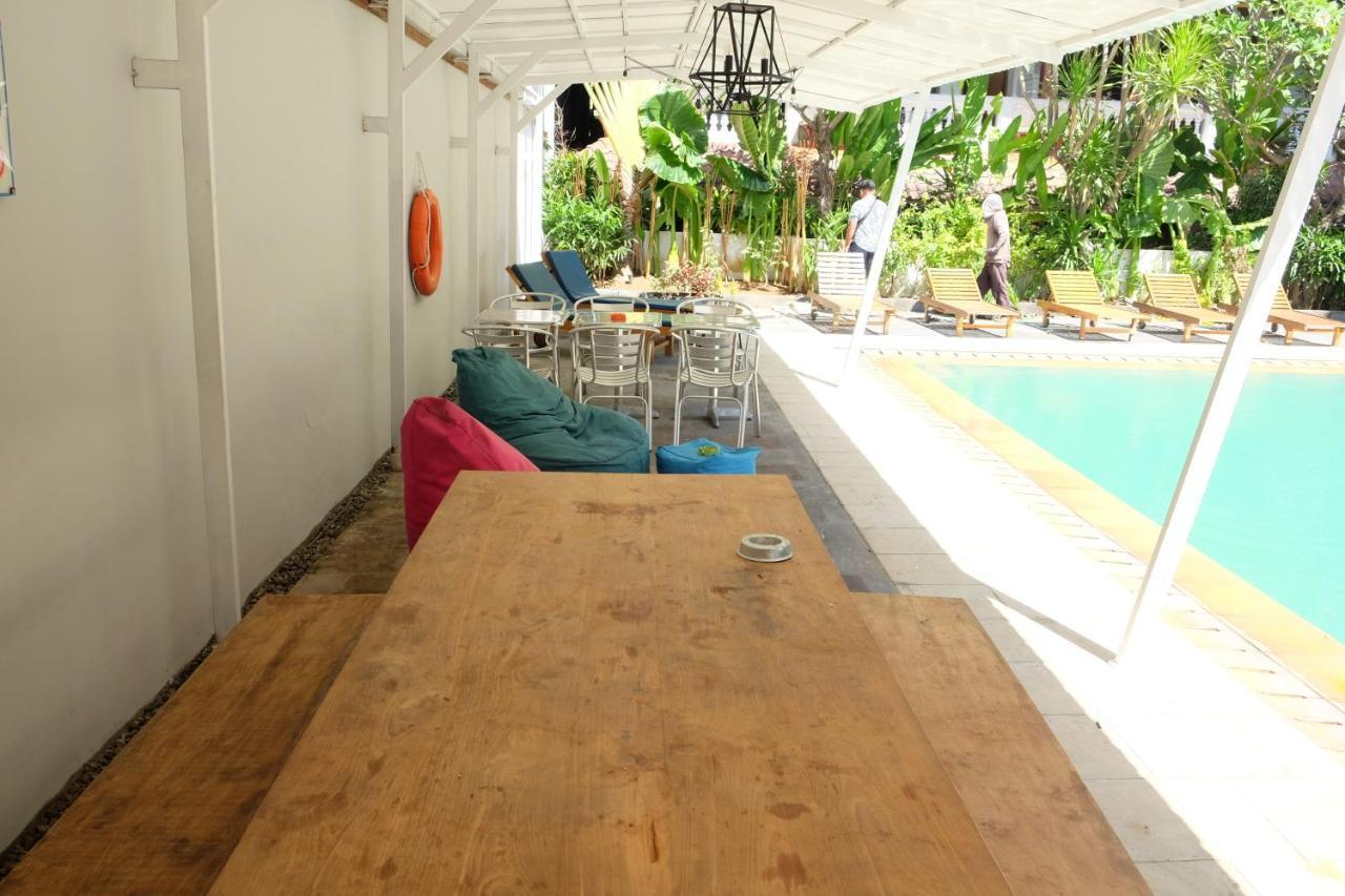 Palm Garden Kuta Hotel Кута Екстериор снимка
