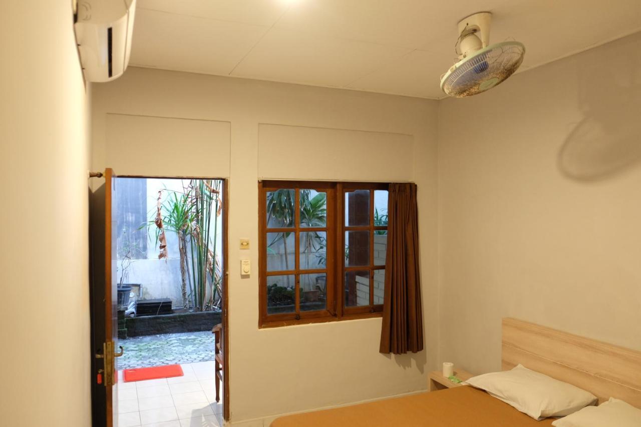 Palm Garden Kuta Hotel Кута Екстериор снимка