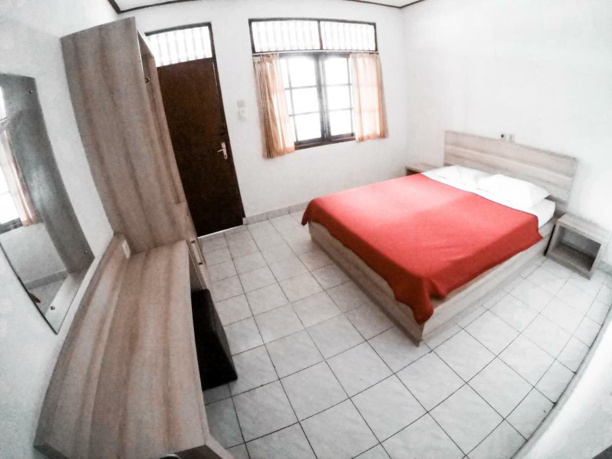 Palm Garden Kuta Hotel Кута Екстериор снимка