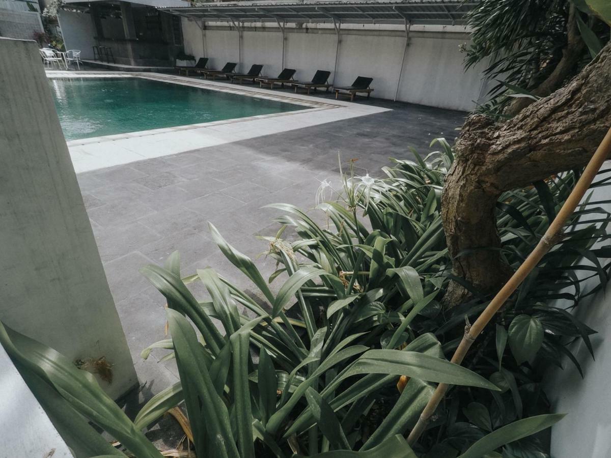 Palm Garden Kuta Hotel Кута Екстериор снимка